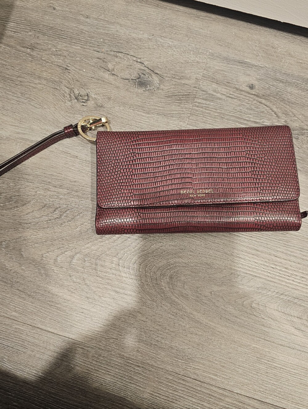 Henri Bendel Burgundy Lizard-Embossed Wristlet Clutch with Gold Hardware